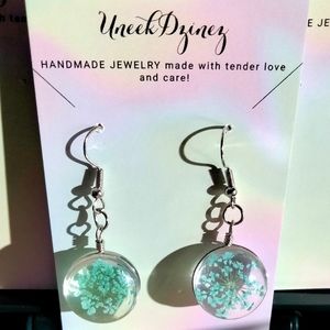 Handmade Drop earrings made of real flowers and resin.